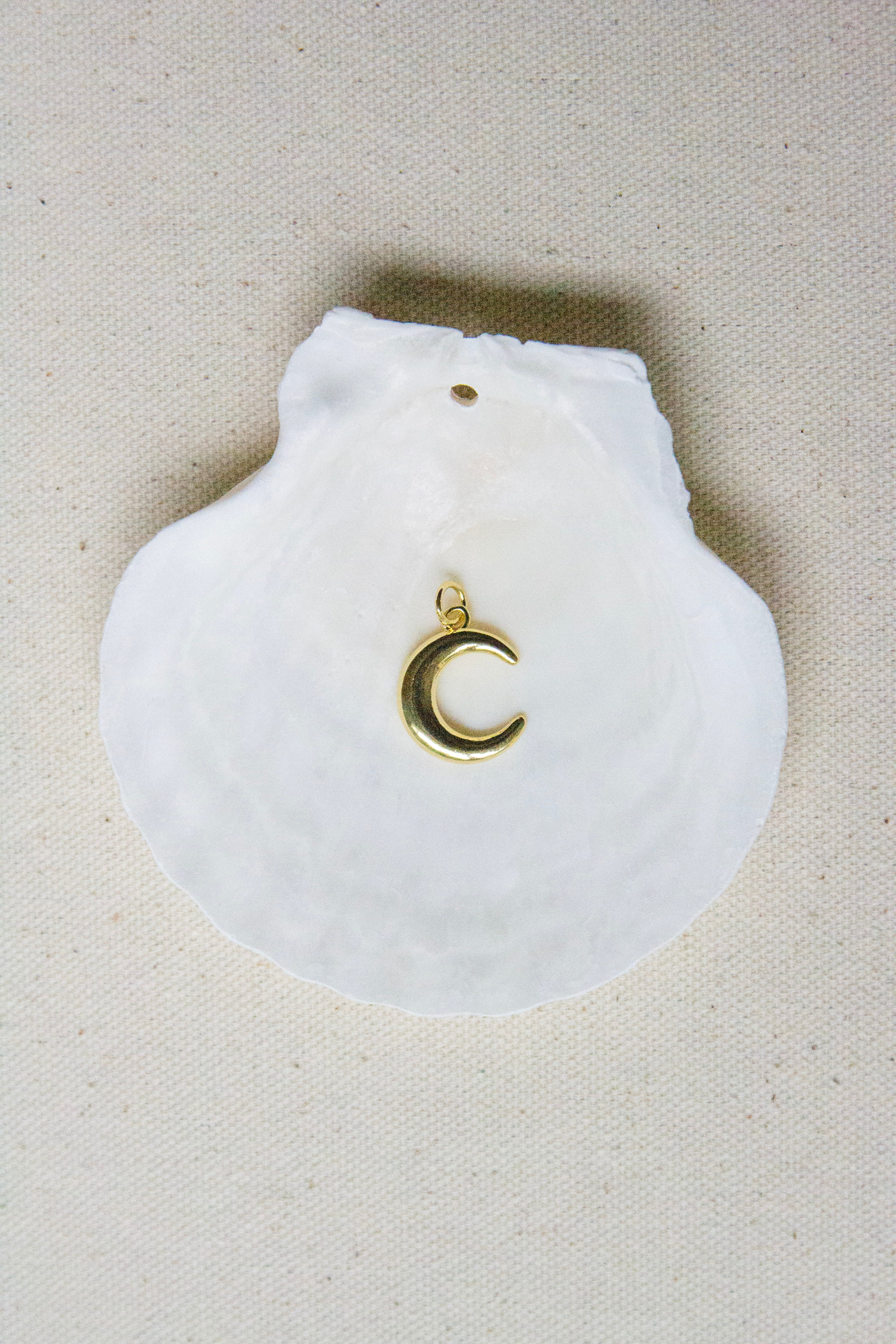 Crescent moon charm